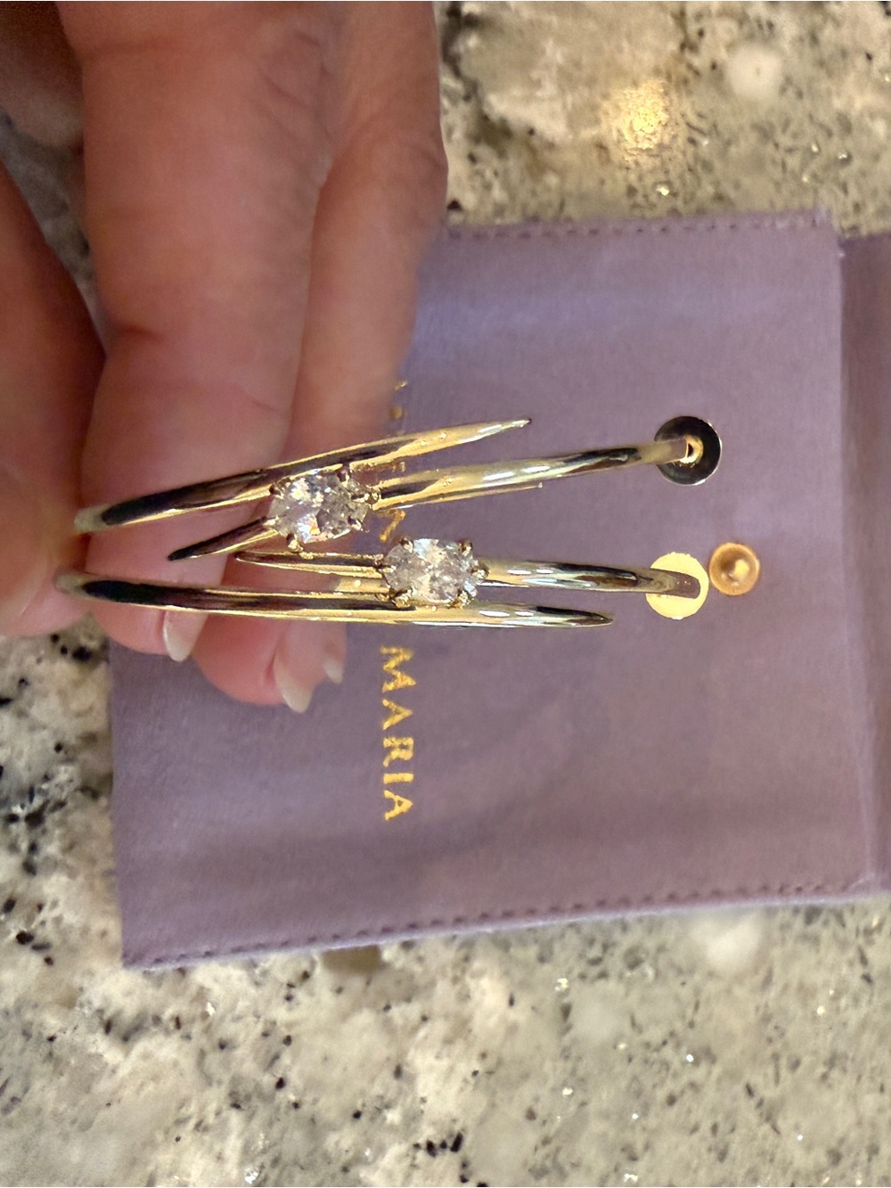 Melinda Maria She’s on Point Lasso Hoop Earrings Silver 2”